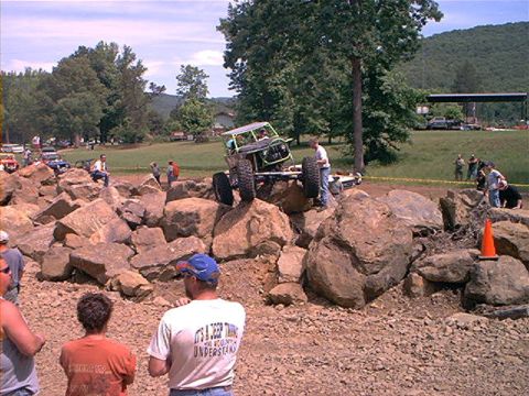 1978 Ford Bronco - A custom off-road vehicle navigates a challenging rock obstacle course.