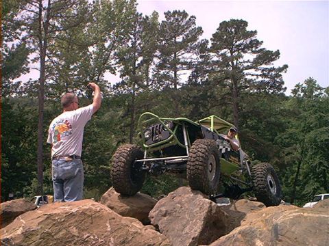1978 Ford Bronco - A custom-built rockcrawler navigates a challenging obstacle course on large boulders.