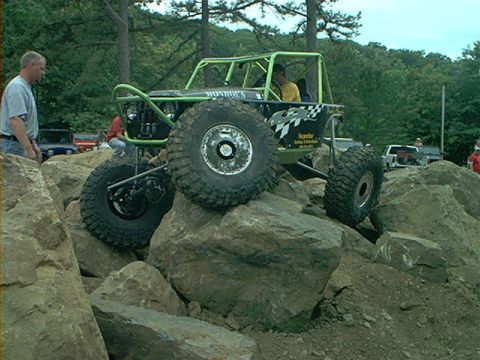 1978 Ford Bronco - A custom-built rockcrawler buggy navigates a challenging rocky terrain.