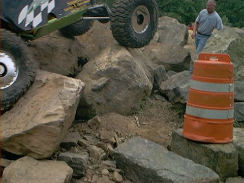 1978 Ford Bronco - A modified off-road vehicle tackles a challenging rock crawling course.
