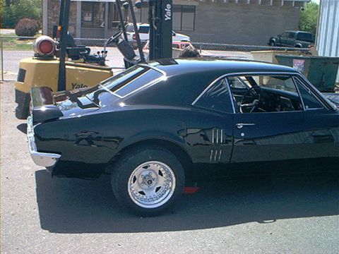 1978 Ford Bronco - This 1967 Pontiac Firebird coupe is shown from the rear quarter angle.