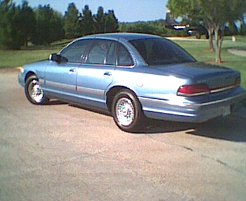 1994 Ford Crown Victoria - This sedan has a distinctive body style from the early to mid-1990s.