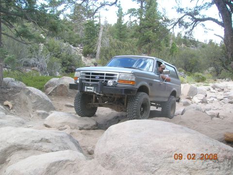 1985 Ford Bronco - Ford Bronco tackles a challenging rocky trail in the mountains. Date stamp reads 09.02.2006.