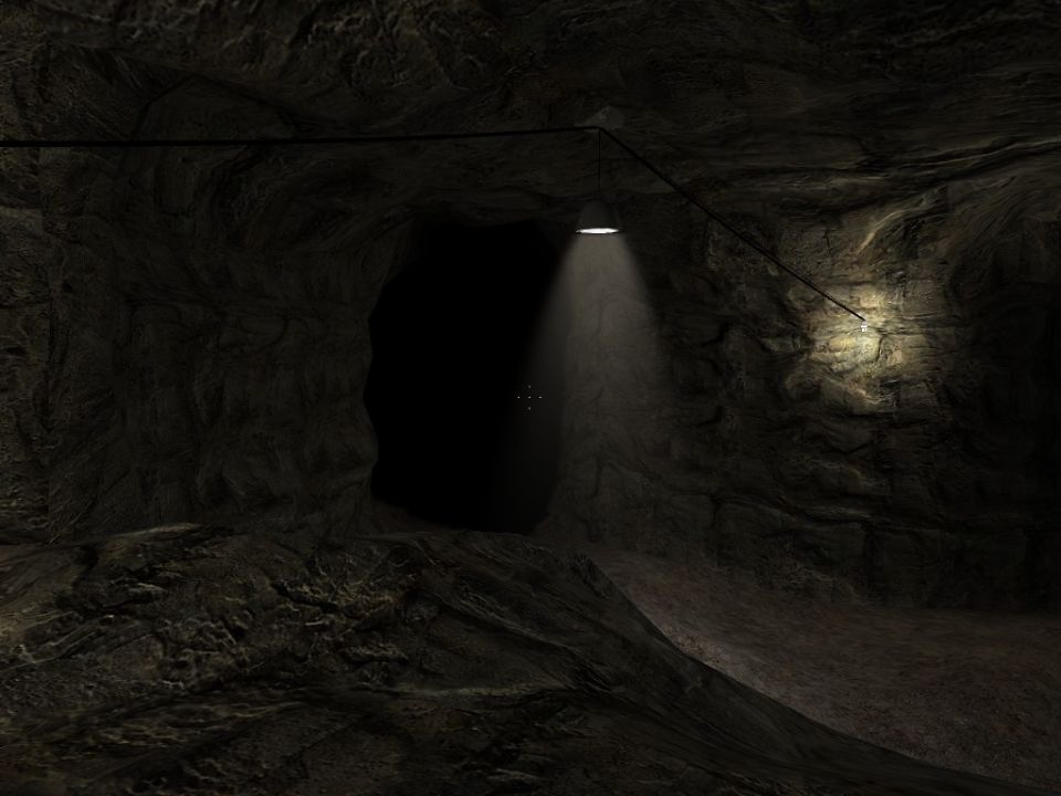 Cave interior with a single light fixture illuminating a dark opening