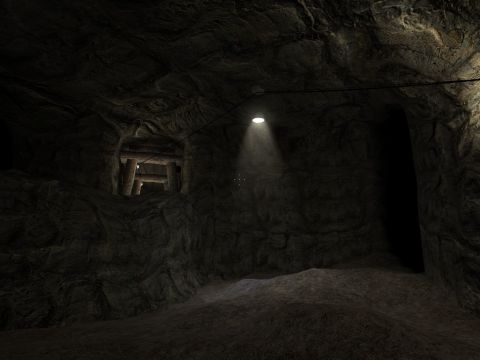 1969 Ford Mustang - Interior of a dark mine tunnel, illuminated by a single overhead light and showing wooden support beams in the distance.