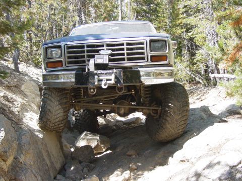 1986 Ford Bronco - This Ford Bronco is shown off-roading on a rocky trail.