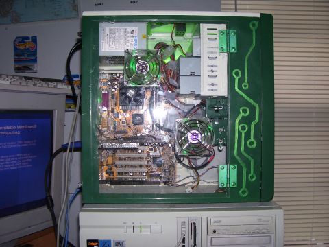 1994 Ford Probe - A custom-painted computer case reveals its internal electronic components and wiring.