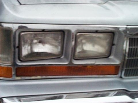 1991 Ford Crown Victoria - Sorry for the crappy pic. A careful eye will notice a crack in the plastic below the high-beam lamp and a 1" x ¼" hole in the parking light…