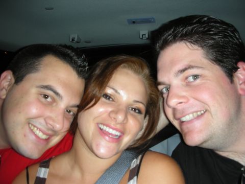 1998 Ford Crown Victoria - Friends share a happy moment inside a car.