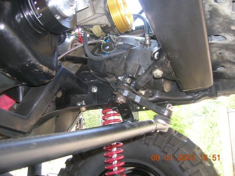 1996 Ford Bronco - Vehicle suspension and engine components are visible in this close-up shot.