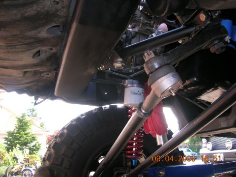 1996 Ford Bronco - Close-up of the steering and suspension system of a vehicle, with a date stamp of 09.04.2006.