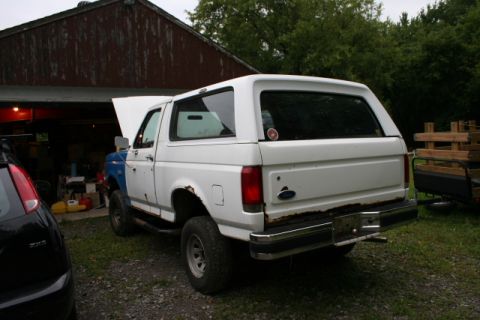 1987 Ford Bronco - This Ford Bronco appears to be from the late 1980s or early 1990s, with some rust on the rear bumper.
