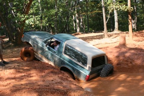 1990 Ford Bronco - This Ford Bronco is stuck in a mud pit during an off-road excursion.