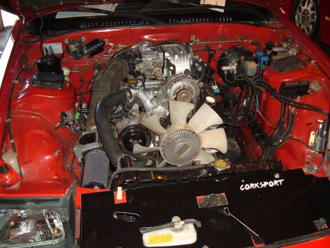 1991 Ford Probe - Close-up of a vehicle's engine bay, showing a rotary engine and associated components.