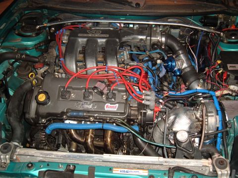 1991 Ford Probe - Engine bay view shows a V6 DOHC 24 valve engine with aftermarket modifications.