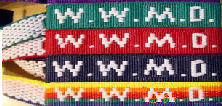 2002 Ford Crown Victoria - Several bracelets with the text W.W.M.D. are stacked on top of each other.