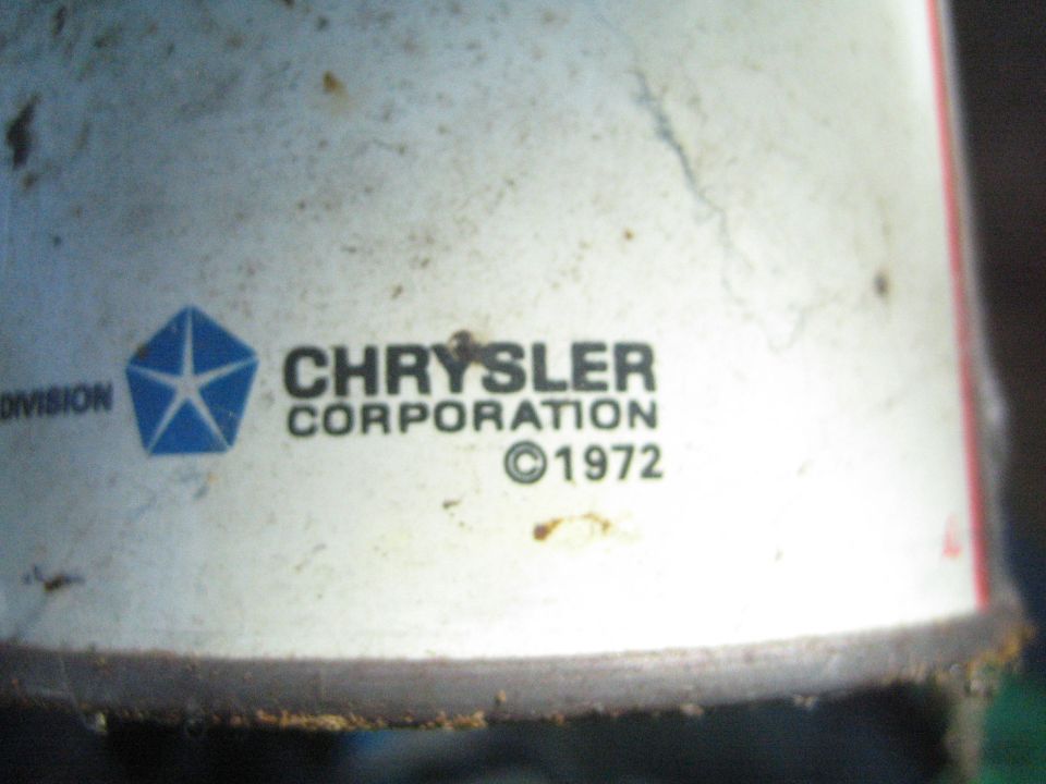 Chrysler Corporation logo with copyright date 1972 visible on a part