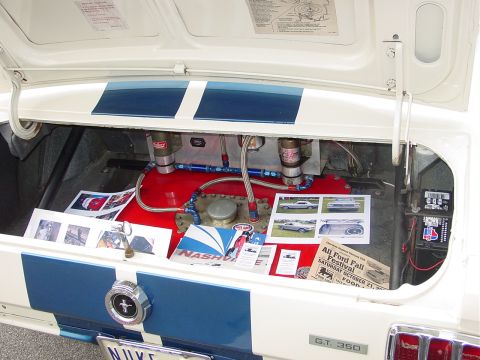 1986 Ford Mustang - Custom fuel cell and racing lines installed in the trunk of a 1967 Ford Mustang.