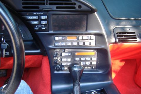 1994 Chevrolet Corvette - The interior of a 1994 Chevrolet Corvette shows the dashboard with its radio and climate control system.