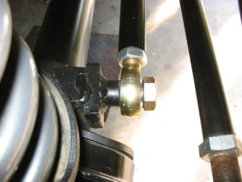 1995 Ford Bronco - Detail of a vehicle suspension component, likely a track bar or steering linkage.