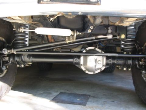 1995 Ford Bronco - Undercarriage view of a 1995 Ford Bronco, highlighting its steering and suspension system.
