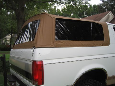 1996 Ford Bronco - spice denim w/ tinted windows