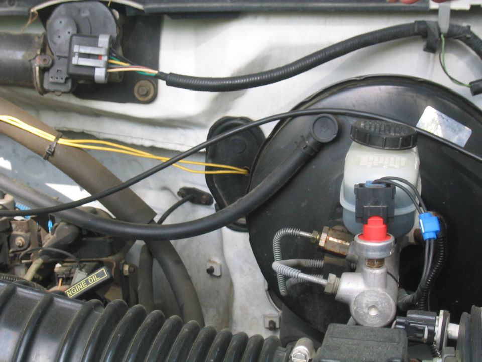 unhook the hose from your brake booster line