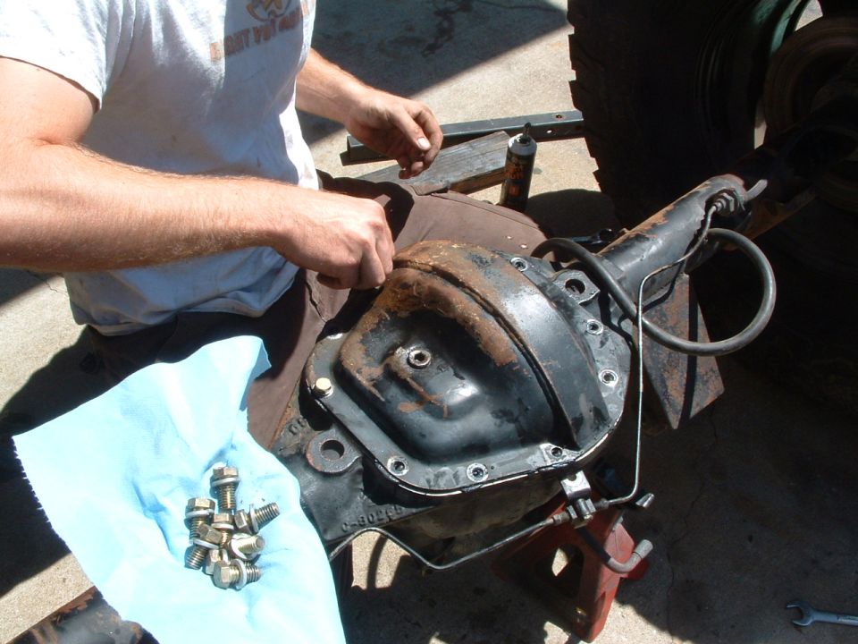 Differential cover removal, bolts on blue cloth