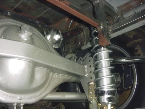 1990 Ford Mustang - Custom rear suspension components are visible, including a differential housing and shock absorber.