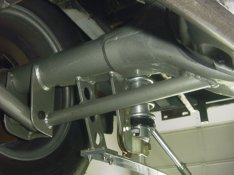 Rear suspension with adjustable coilover shock absorber