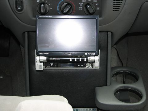 2002 Ford Crown Victoria - Aftermarket Kenwood stereo and screen installed in the center console.