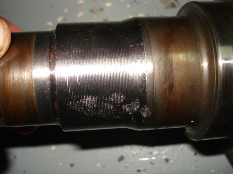 Some scars on the 85 spindle.  I guess the last person who worked on it banged it around a little.