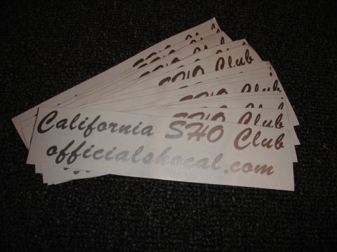 1993 Ford Taurus - Multiple stickers for the California S30 Club are fanned out on a dark, textured surface.
