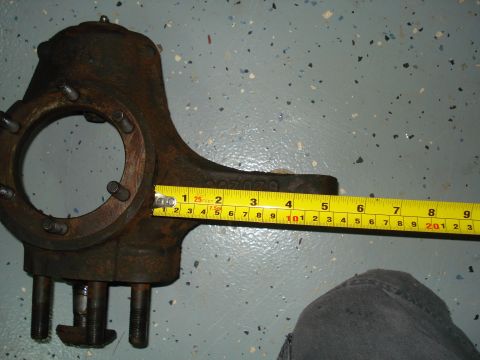 1996 Ford Bronco - Shows me measuring the arm on the knuckle. Its about 5.4 inches, the angle on the camera is funny.
