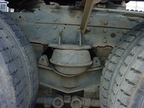 1979 Ford Bronco - Close-up view of the air suspension system on a heavy-duty truck, showing the bellows and supporting structure.