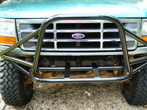 1996 Ford Bronco - Front view of a 1996 Ford Bronco, a chrome grille and a custom bull bar.