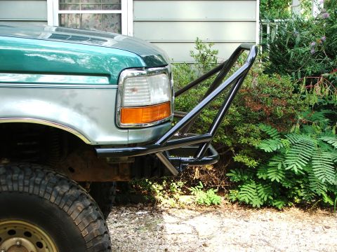 1996 Ford Bronco - Custom brush guard attached to the front of a 1990s Ford F-Series truck.