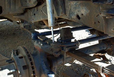 1986 Ford Bronco - Close-up view of a front suspension bump stop, likely from a truck or SUV.