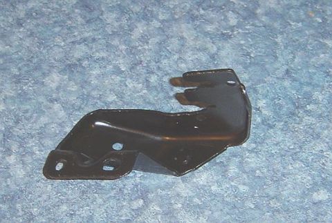 1986 Ford Bronco - Throttle bracket shown against a textured blue background.