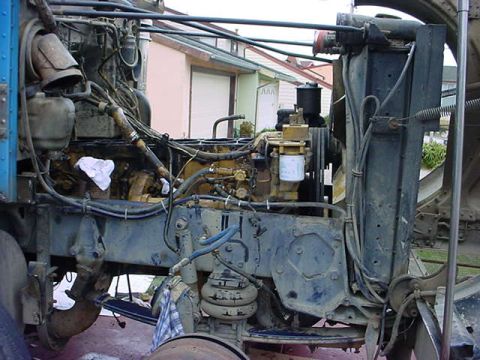1979 Ford Bronco - Engine compartment of a heavy-duty truck, showing complex mechanical systems.