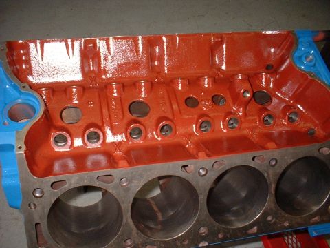 1969 Ford Mustang - Close-up of an engine block, showing the cylinder bores and internal passages.