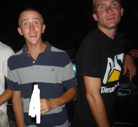 1974 Ford F-100 - Two young men are pictured together, one holding a bottle of beer.