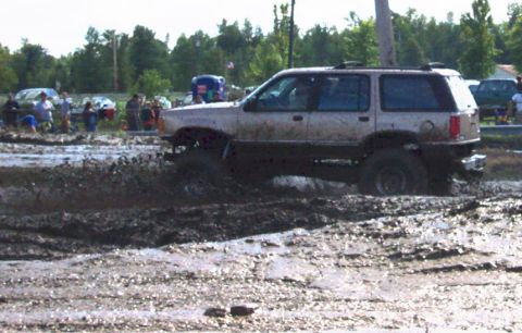 1979 Ford Bronco - This SUV is deep in the mud during an off-road event.