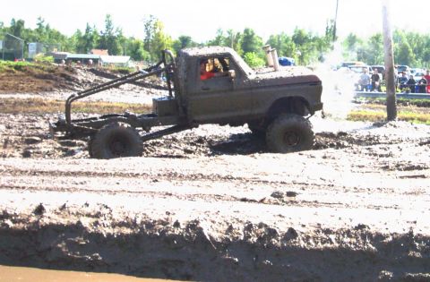 1979 Ford Bronco - This heavily modified truck is stuck in a mud bog, not a 1979 Ford Bronco.