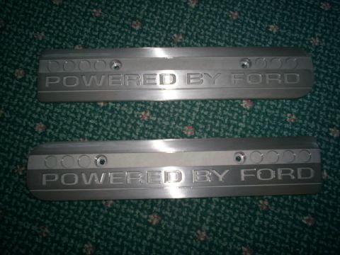 2003 Mercury Marauder - Engine coil covers with 'POWERED BY FORD' engraving are shown.
