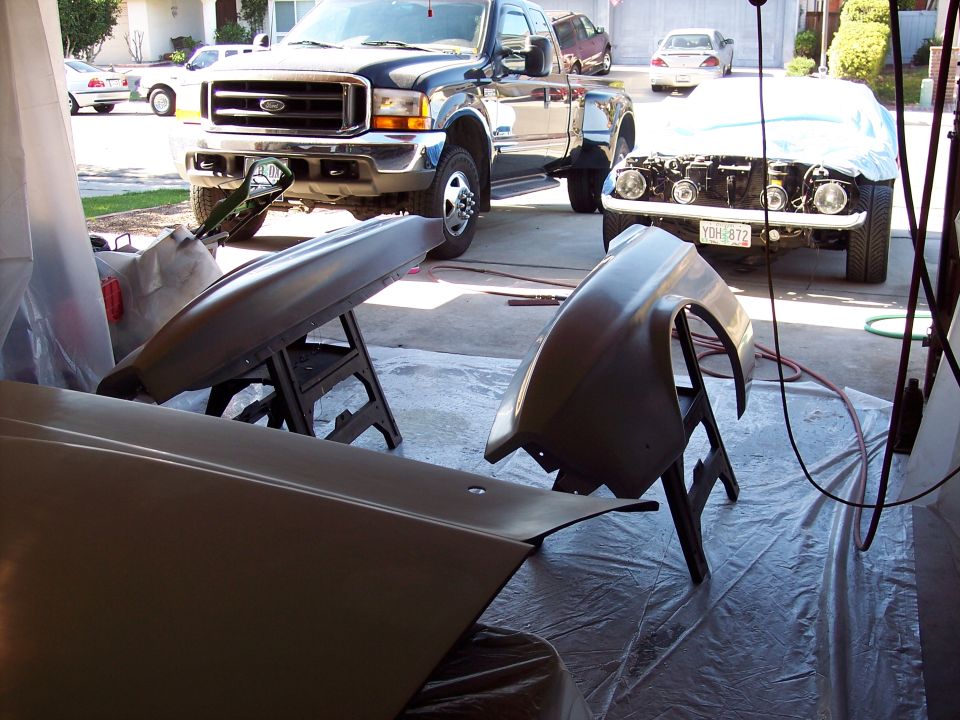 prepped fenders and hood waiting for paint