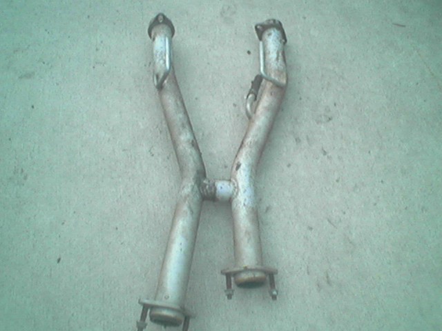 Exhaust pipe Y-pipe on concrete surface