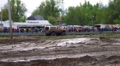 1978 Ford Bronco - Mud bogging event features a 1978 Ford Bronco navigating a challenging course.