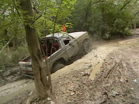 1988 Ford Bronco - This 1988 Ford Bronco tackles a challenging muddy off-road course.
