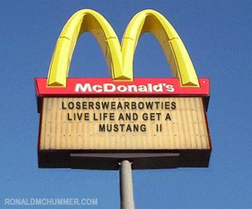 1978 Ford Mustang II - A McDonald's sign displays a message referencing a Mustang II.